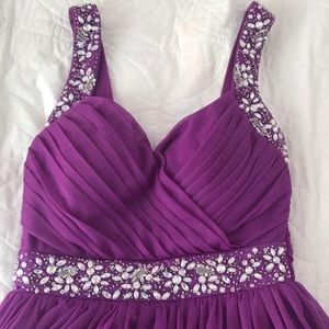 Selling a formal dress for special events.